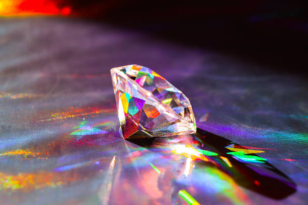 istock Holographic background. Diamond on shiny background. Rainbow effect. 2204704594