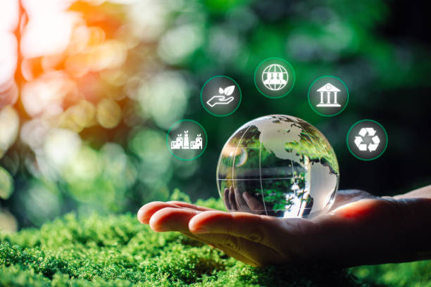 istock Hand protect globe on green nature background with icon Environmental, renewable, sustainable energy, CO2, net zero, recycle, ESG concept for low, neutral carbon. Ecology and Environment day concept 2204706481
