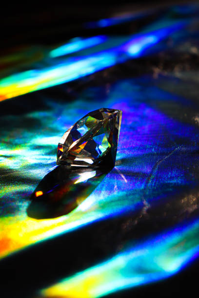 istock Holographic background. Diamond on shiny background. Rainbow effect. 2204706572
