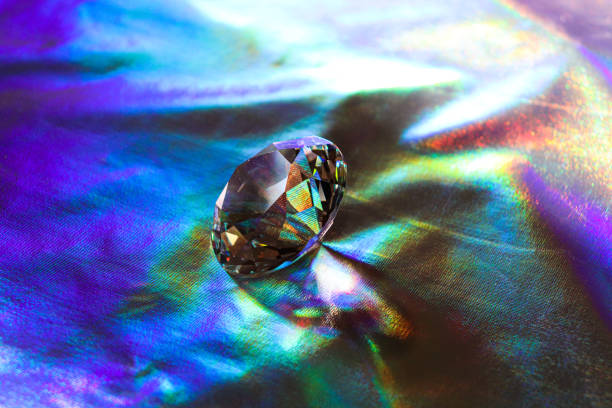 Holographic background. Diamond on shiny background. Rainbow effect.