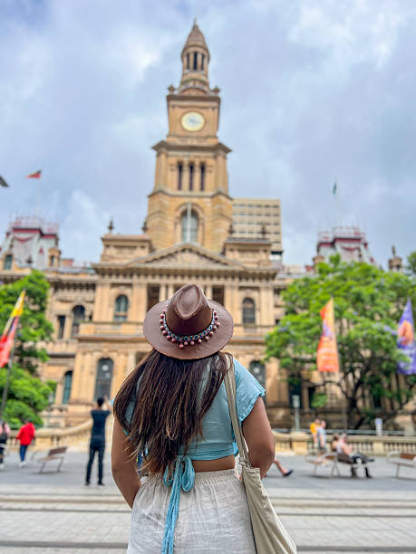 istock Woman in Hat Exploring Historic City Landmark 2204708362