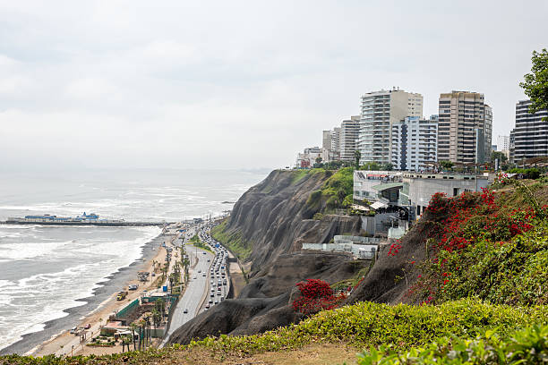 istock Coastal Cityscape Overlooking Ocean with Cliffside Road 2204709132