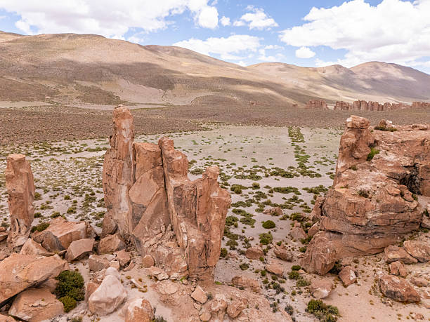 istock Rocky Desert Landscape with Cloudy Sky 2204709788
