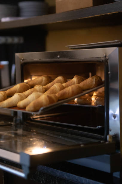 istock Freshly Baked Croissants in a Cozy Bakery 2204710775