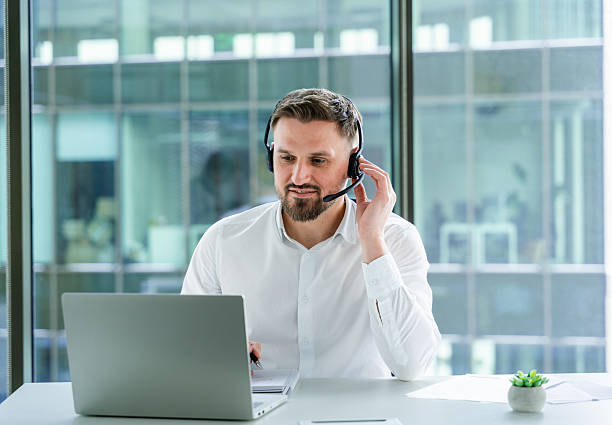 istock Successful Business Professional Conducting Virtual Meeting in Modern Office 2204711078