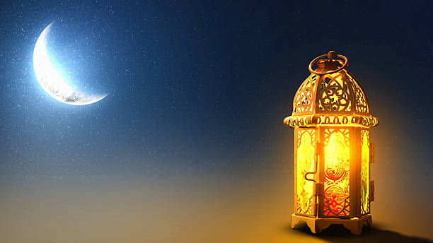 istock Traditional glowing Arabic lantern with crescent moon view on night scene background. Copy space or mockup. Concept of Eid Al Fitr and Ramadan Mubarak. Islamic background 2204713194