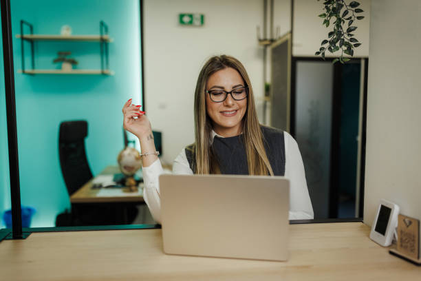 istock Charming Young Businesswoman Working in Office 2204713912
