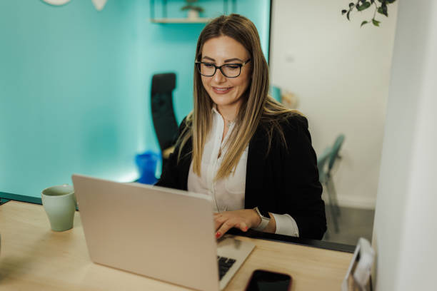 istock Young Businesswoman Working in Office Space 2204713997