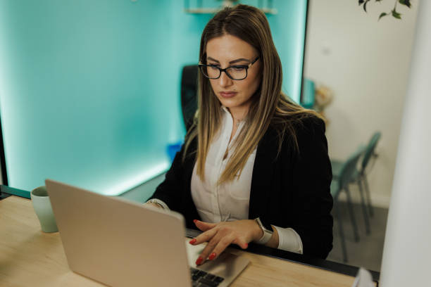 istock Businesswoman Working in Modern Office Space 2204714031