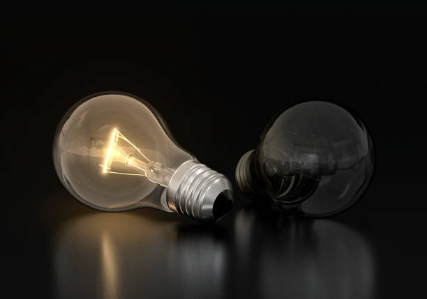 A compact fluorescent lamp (CFL) is lying on the floor, a spiral fluorescent lamp.
