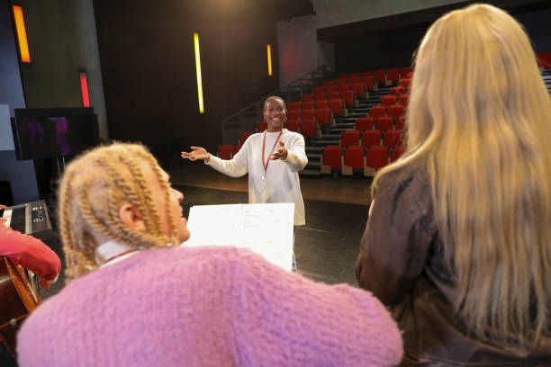 istock Persons with disabilities performing music on stage 2204718796