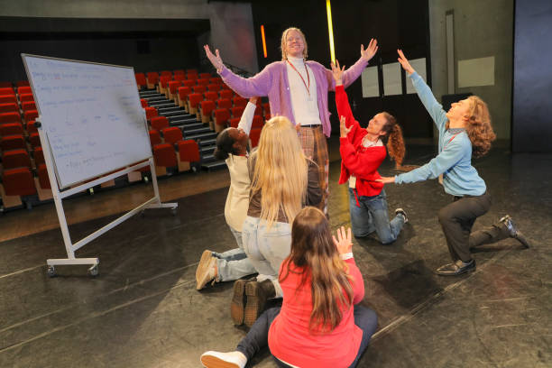 istock Actors with disabilities rehearsing on stage 2204719115