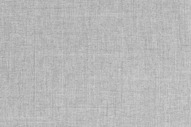 istock White grey linen fabric texture background, seamless pattern of natural textile. 2204721613