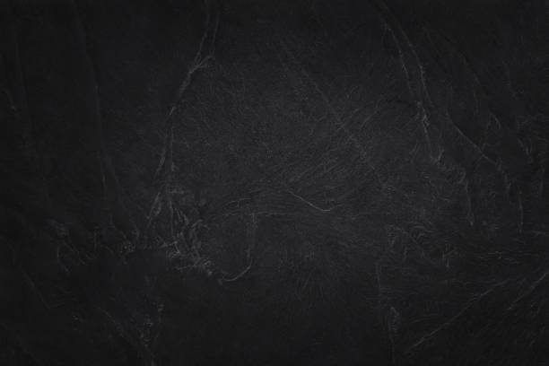 istock Dark grey black slate texture in natural pattern with high resolution for background and design art work. Black stone wall. 2204721767