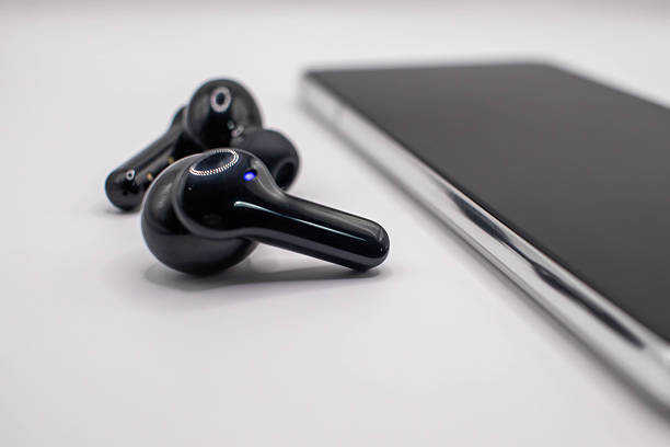 istock Headphones and smartphone on the side. 2204724166