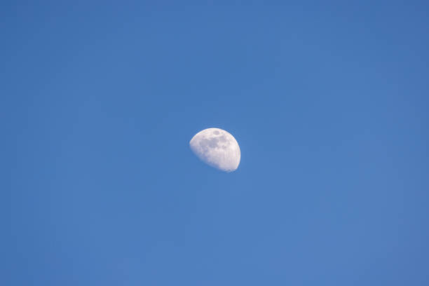 istock The moon in the sky on a spring evening 2204724614