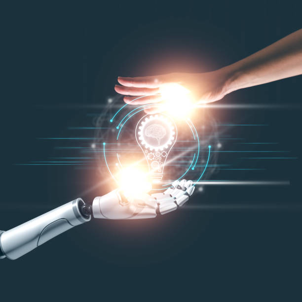 istock AI Deep learning of artificial intelligence technology, Robot hand and human hand touch on big data network connection of AI brain 2204725297