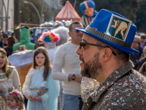 Montecastrilli, Terni, Umbria, Italy - February 23, 2025:In Montecastrilli, a small village in Umbria, carnival is celebrated in total freedom, on the street with full respect for safety regulations,everyone participates and dresses up, bringing small allegorical floats pulled by hand onto the street, in the end there is a winner as best mask and one as a group, fun guaranteed.