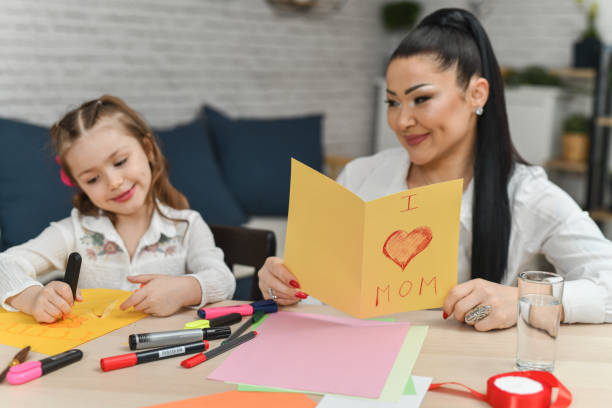 istock Mother and Daughter Expressing Love Through DIY Artwork and Cards 2204726848