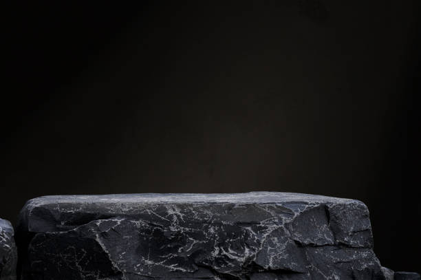 istock Background Black Platform and Dark Grey Rock Display,Studio Room with Stone Podium Stand for Cosmetic Product Design,Blank Interior wall texture with nature light,shadow for beauty template stage 2204727108