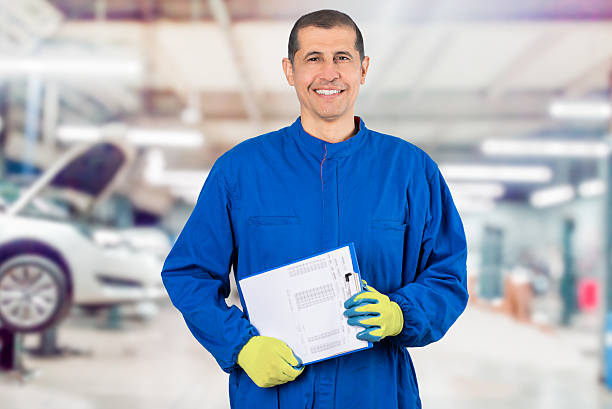istock Happy mechanic at the workshop 2204727737