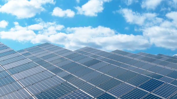 istock Aerial View of Solar Panel Array in a Sunlit Modern Power Facility 2204728615