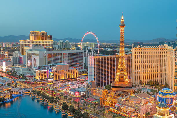 Las Vegas, NV, USA - April 4, 2018: Hotels and Casinos along the strip at dusk. The internationally renowned major resort city is known primarily for its gambling, shopping, fine dining, entertainment, and nightlife.