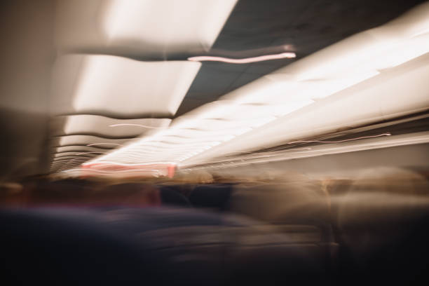 istock Abstract Motion Blur Inside an Airplane Cabin at Night 2204729233