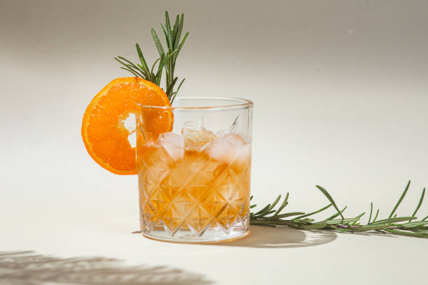 istock Cocktail with fruit and ice in a glass. Lemonade with ice. Summer cocktail 2204729447