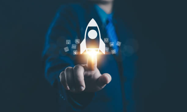 istock Businessman and rocket start flying up and network line connection. Startup concept  Planning and starting corporate business start up, Rocket soars with speed to hit the growth target. 2204731559