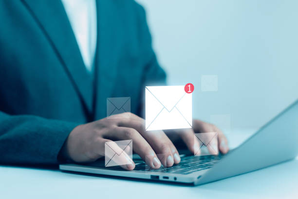 istock New email notification concept, business online communication, email communication, digital marketing, businessman responding to floating digital interface showing new email notification symbol. 2204731743