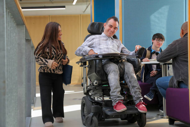 istock Teachers and students with disabilities at university 2204732567