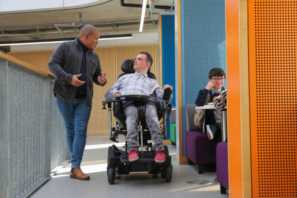 istock Teachers and students with disabilities at university 2204732576