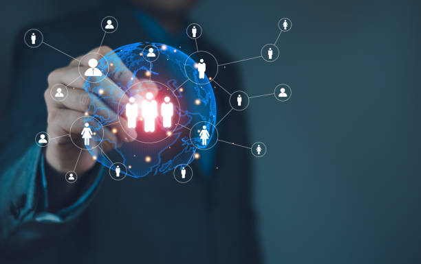 istock A person interacts with a digital interface showcasing network connections and user icons, symbolizing technology and social connectivity. 2204734406