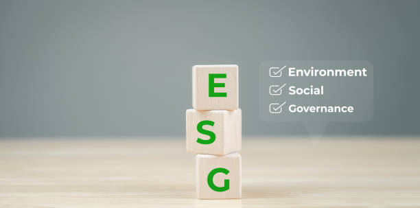 istock Blocks displaying ESG acronym with green letters on a neutral background, highlighting Environment, Social, and Governance concepts. 2204734462