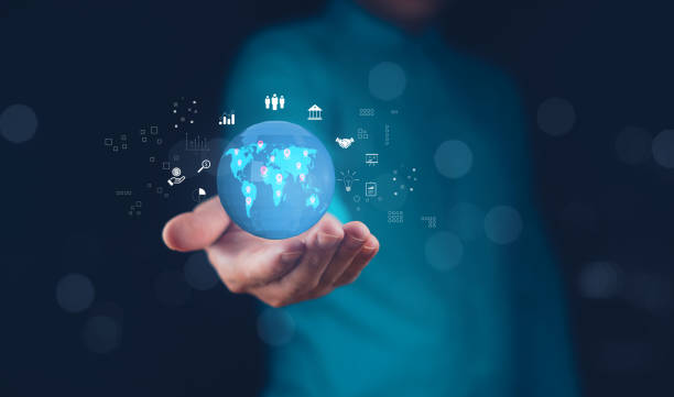istock A person holds a glowing globe symbolizing global connectivity and technology in a dark environment. 2204734515