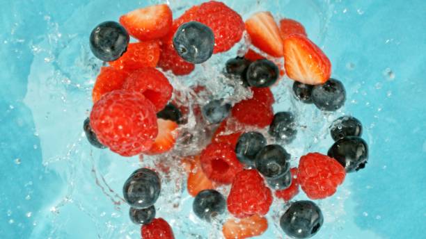 istock Freeze Motion of Berries Falling into Water, Splashing. 2204735681