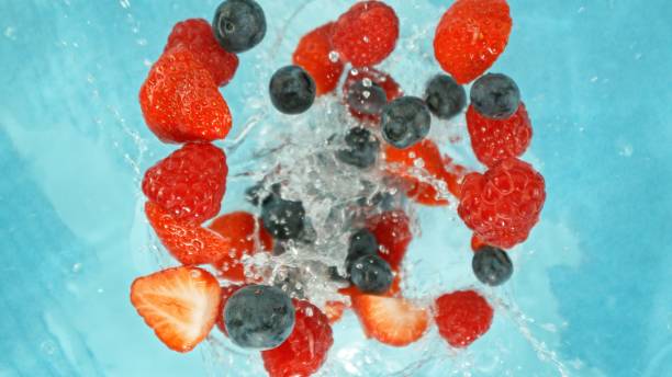 istock Freeze Motion of Berries Falling into Water, Splashing. 2204735719