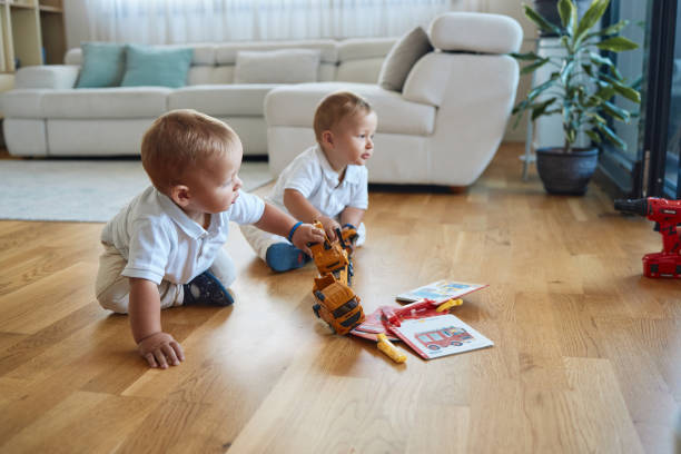 istock Playful twin baby boys 2204744712
