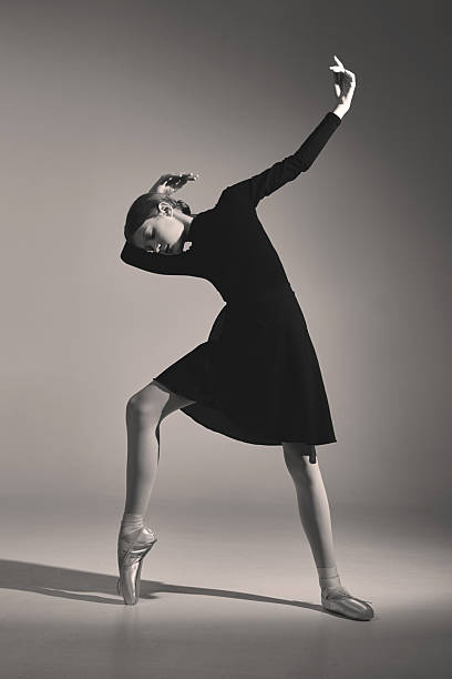 istock The young ballerina is posing in the studio 2204745137