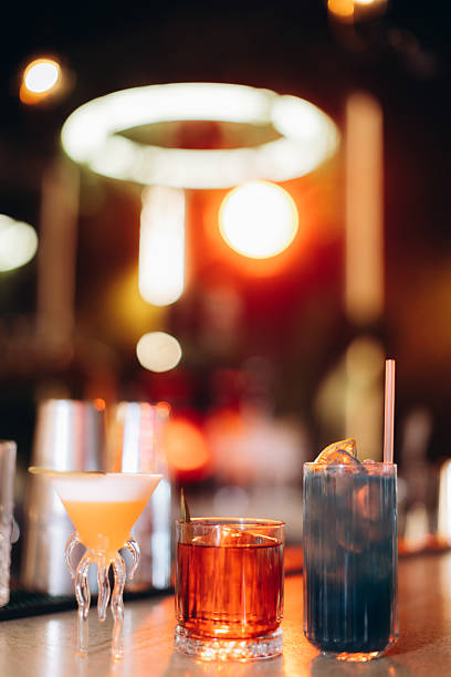 istock Assorted Cocktails on Bar Counter in Elegant Lounge Setting 2204746864