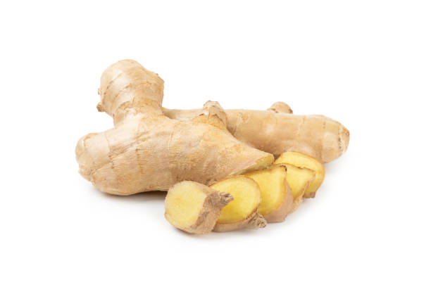 istock Fresh ginger and lemon isolated on white background. Sliced ​​ginger. Ginger root. Traditional alternative medicine, healing tea for immunity. Close-up. 2204747309
