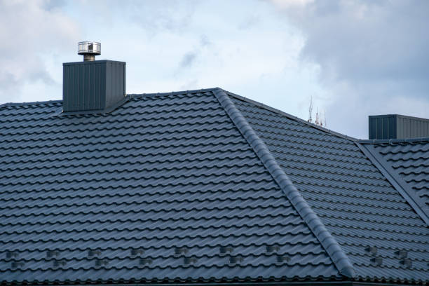 istock A modern house roof showcasing textured tiles and functional chimney structures under a cloudy sky, highlighting architectural design and home aesthetics 2204749318