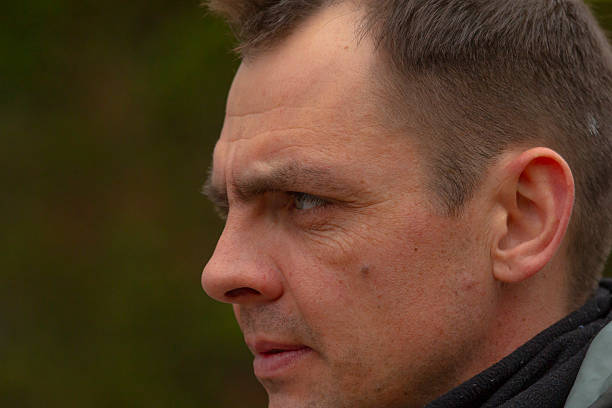 istock A closeup shot of a man with a serious expression on his face 2204754007