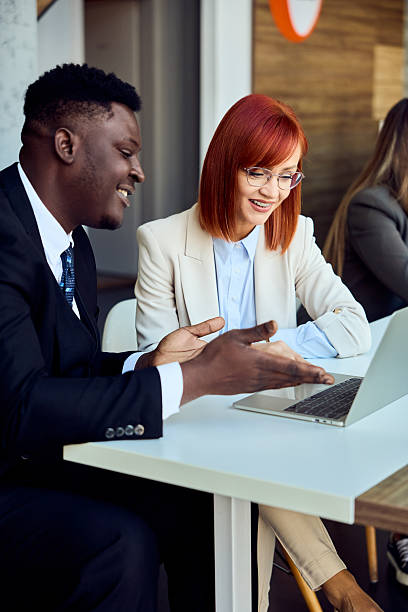 istock Professional Business Meeting Between Two Colleagues in a Modern Office Setting 2204755270