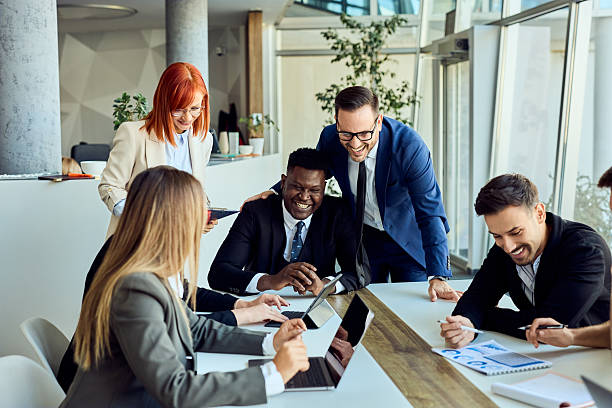 istock Business Team Collaborating During a Productive and Professional Workspace Meeting 2204755289