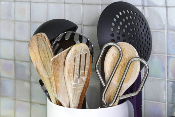 istock Classic kitchen utensils made of wood, plastic and metal. 2204756342