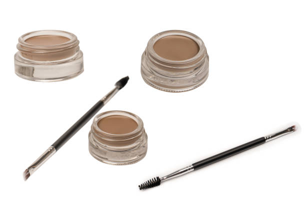 istock A brow pomade in blonde shade with brush isolated on a white background. 2204756691