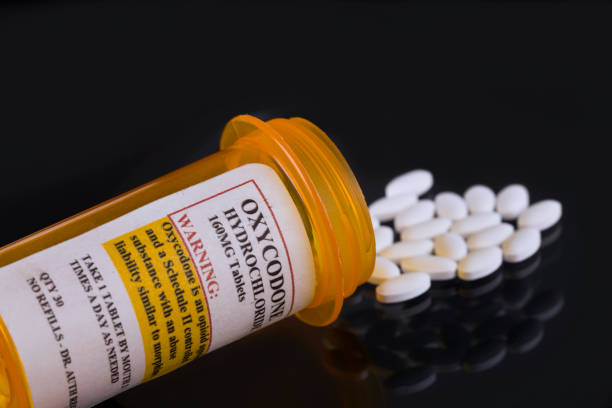 istock Prescription opioid drug, Oxycodone Hydrochloride, close up 2204763790