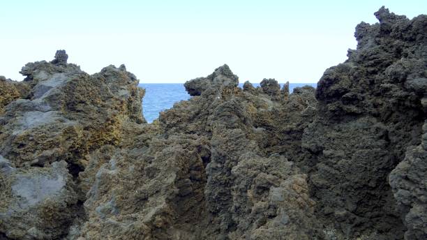 istock Solidified lava rocks creating a suggestive landscape in Lanzarote 2204764601